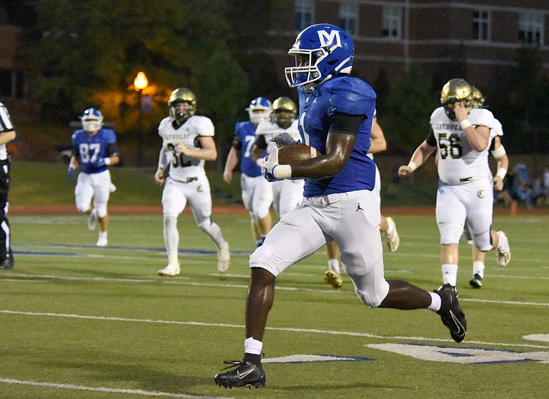 Staff photo by Matt Hamilton / McCallie's Kenzy Paul breaks into the open after a catch during Friday night's home game against Knoxville Catholic.