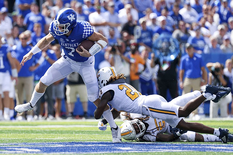 AP photo by Michael Clubb / Kentucky quarterback Will Levis is tackled by UTC defensive back Telly Plummer on Saturday.