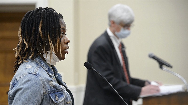 Destini Mitchell, a tenant at Vineville Townhomes East in Macon, explains to Chief Judge Pamela White-Colbert of Bibb County Civil and Magistrate Court that a payment of more than $4,000 had been made from the Georgia Rental Assistance program, Tuesday, Sept. 7, 2021 in Macon, Ga. Mitchell was given an eviction notice in July, two months after she applied for assistance.(Jenna Eason/The Macon Telegraph via AP)