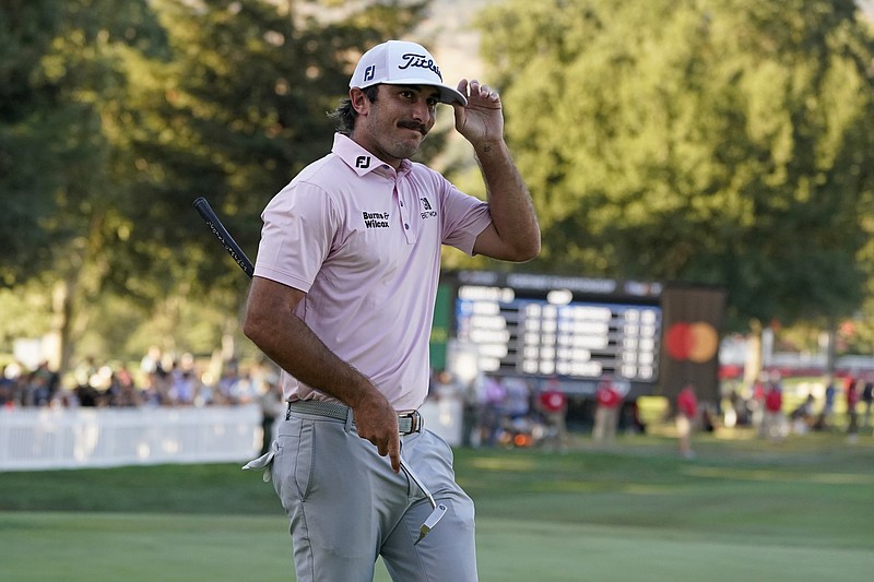 AP photo by Eric Risberg / Max Homa acknowledges the crowd on the 18th green of the Silverado Resort North Course after shooting a 65 in the final round of the Fortinet Championship on Sunday in Napa, Calif. Homa won the tournament, the first of the PGA Tour's 2021-22 schedule.