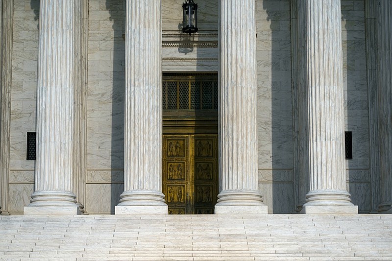 This Friday, Sept. 3, 2021, photo shows the Supreme Court in Washington. The Supreme Court's decision this past week not to interfere with the state's strict abortion law, provoked outrage from liberals and cheers from many conservatives. President Joe Biden assailed it. But the decision also astonished many that Texas could essentially outmaneuver Supreme Court precedent on women's constitutional right to abortion. (AP Photo/J. Scott Applewhite)