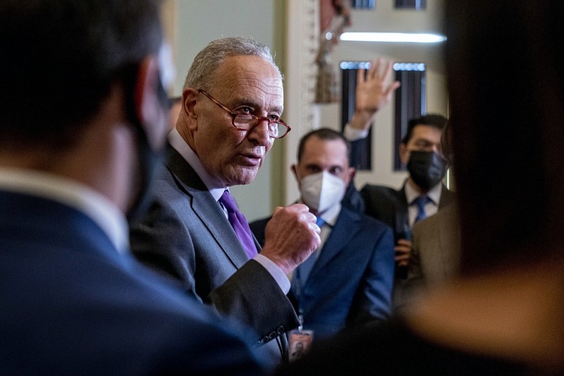 Senate Majority Leader Chuck Schumer, D-N.Y., speaks to reporters as work continues on the Democrats' Build Back Better Act, massive legislation that is a cornerstone of President Joe Biden's domestic agenda, at the Capitol, in Washington, Tuesday, Sept. 14, 2021. (AP Photo/Andrew Harnik)


