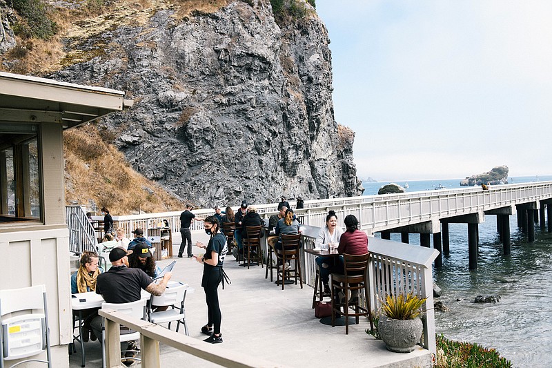 Photo by Alexandra Hootnick / The New York Times / Diners at the Seascape Restaurant in Trinidad, in California's Humboldt County, are shown on Aug. 22, 2021. The recent governor recall election has resurfaced talk of a "California exodus."