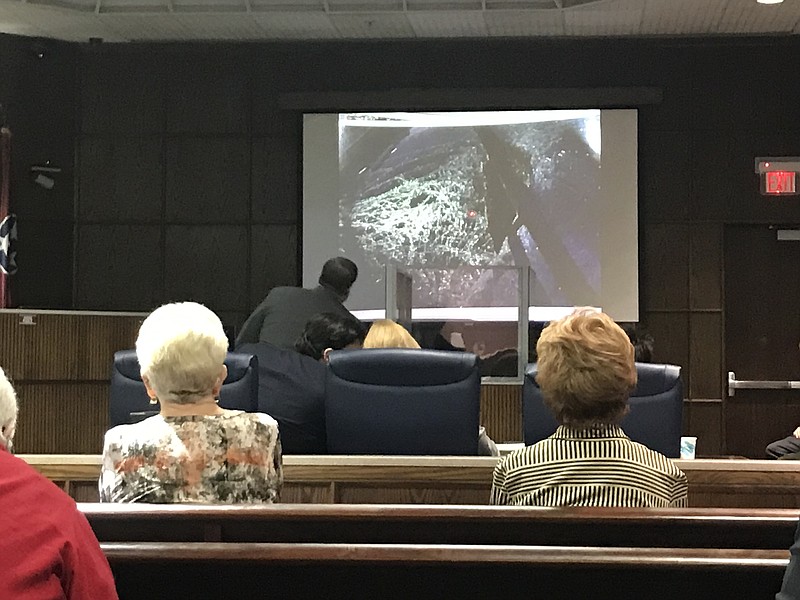 Staff photo by Emily Crisman / A photo of the shattered windshield of Janet Hinds' car is shown during her trial for the hit-and-run death of Nicholas Galinger on Tuesday.