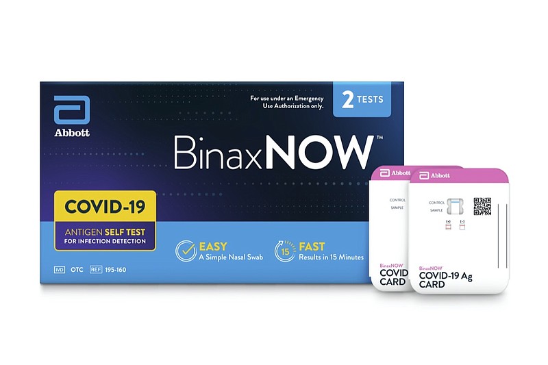 This image provided by Abbot in September 2021 shows packaging for their BinaxNOW self test for COVID-19. President Joe Biden is betting on millions more rapid, at-home tests to help curb the latest deadly wave of the COVID-19 pandemic, which is overloading hospitals and threatening to shutter classrooms around the country. But the tests have already disappeared from pharmacy shelves in many parts of the U.S., and manufacturers warn it will take them weeks to ramp up production, which was slashed after demand for the tests plummeted over the summer of 2021. (Abbot via AP)