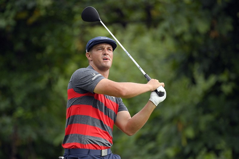 FILE - In this Aug. 29, 2021, file photo, Bryson DeChambeau tees off from the 16th hole during the final round of the BMW Championship golf tournament at Caves Valley Golf Club in Owings Mills, Md. When DeChambeau arrives at Whistling Straits for the Ryder Cup the 6-foot-1, 235-pound disrupter with a world-leading driving average of 323.7 yards, will bring with him an epic amount of baggage. He is in the middle of a months-long feud with one of his teammates, Brooks Koepka, who happens to have three more major titles than DeChambeau. (AP Photo/Nick Wass, File)