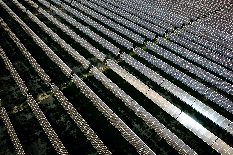 New York Times photo by Erin Schaff / This aerial view of panels at the nearly 2,000 acre Assembly Solar Project near Flint, Michigan, on May 17, 2021 shows how a green economy can shape up.