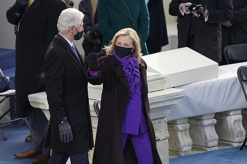 Photo by Carolyn Kaster of The Associated Press / Former President Bill Clinton and former Secretary of State Hillary Clinton arrive for the 59th Presidential Inauguration at the U.S. Capitol in Washington onWednesday, Jan. 20, 2021.