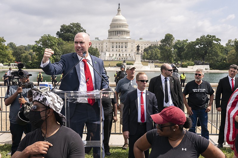 Photo by Nathan Howard of The Associated Press / Matt Braynard, organizer of the Justice For J6 rally, speaks near the U.S. Capitol in Washington on Saturday, Sept. 18, 2021.