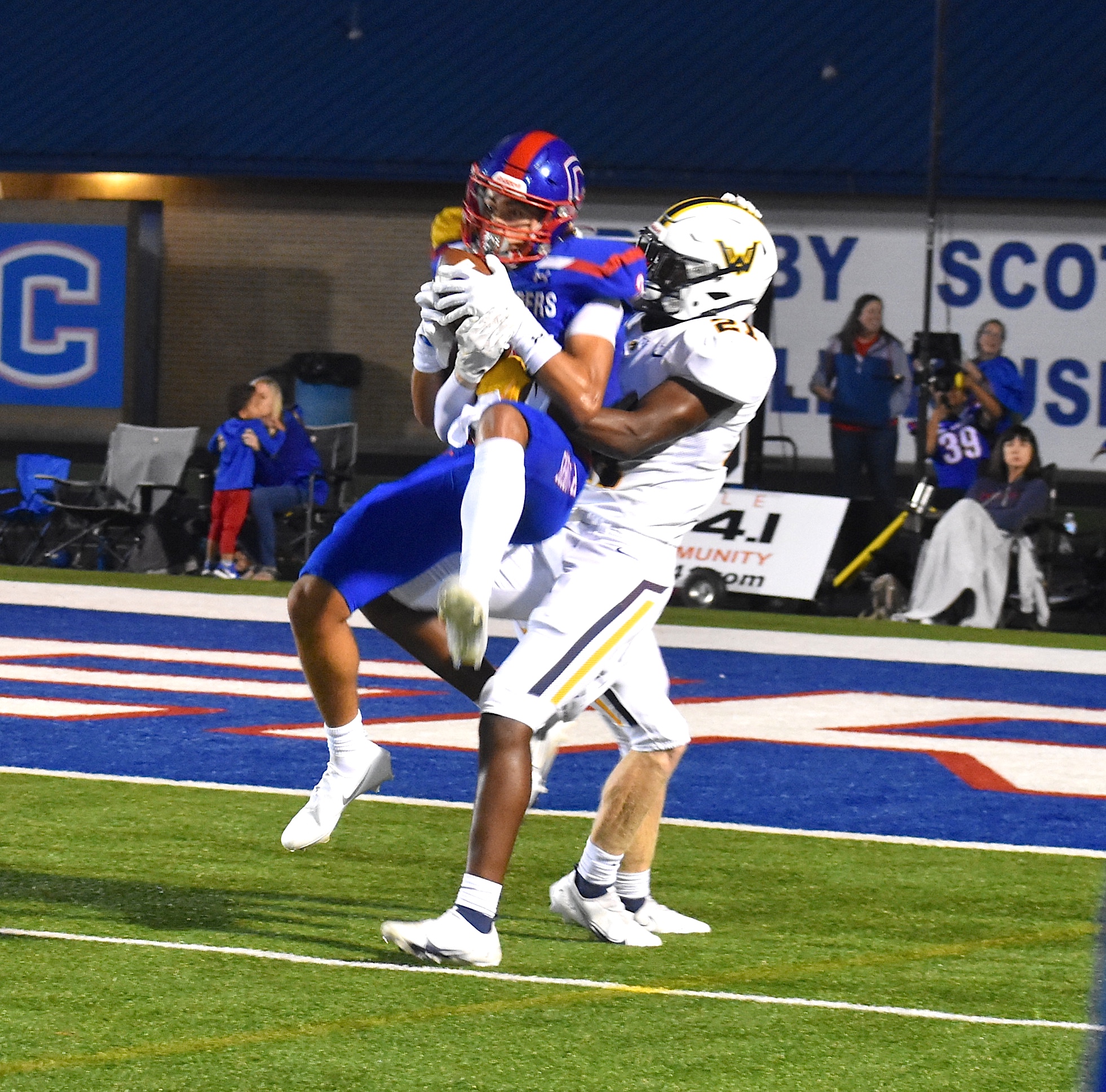 Staff photo by Patrick MacCoon / Cleveland senior Destun Thomas makes a leaping grab against the Walker Valley defense in Friday's home game at Benny Monroe Stadium.
