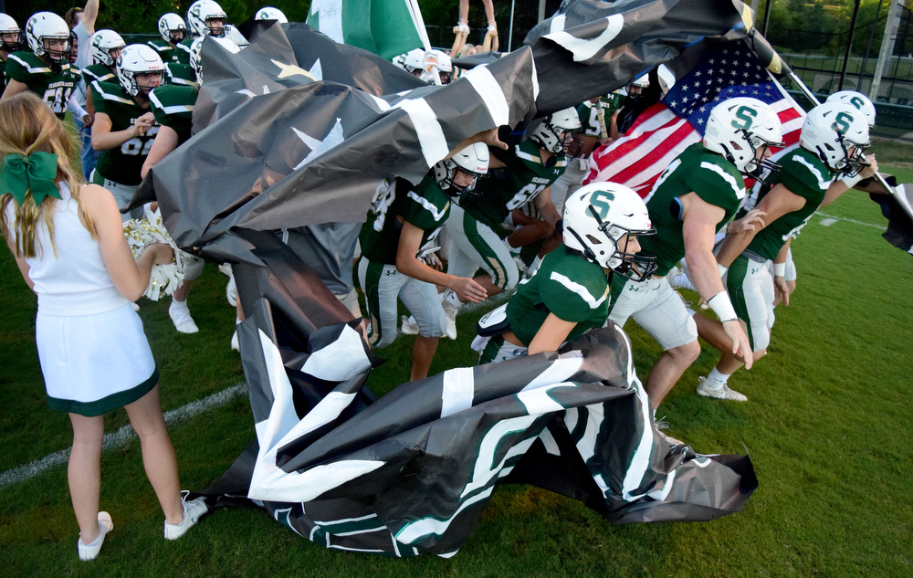 Staff Photo by Robin Rudd / The Seahawks break through the banner as they take the field. The Silverdale Academy Seahawks hosted the Donelson Christian Academy Bobcats in TSSAA football on September 24, 2021.
