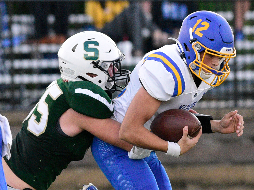 Staff Photo by Robin Rudd / Silverdale's Kyle Shoemaker (55) sacks Donelson quarterback Bradford Gaines (12). The Silverdale Academy Seahawks hosted the Donelson Christian Academy Bobcats in TSSAA football on September 24, 2021.