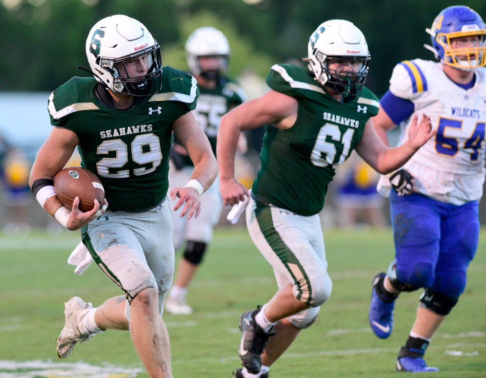 Staff Photo by Robin Rudd / Silverdale's Connor Delashmitt (29) runs for the first Seahawk touchdown. The Silverdale Academy Seahawks hosted the Donelson Christian Academy Bobcats in TSSAA football on September 24, 2021.