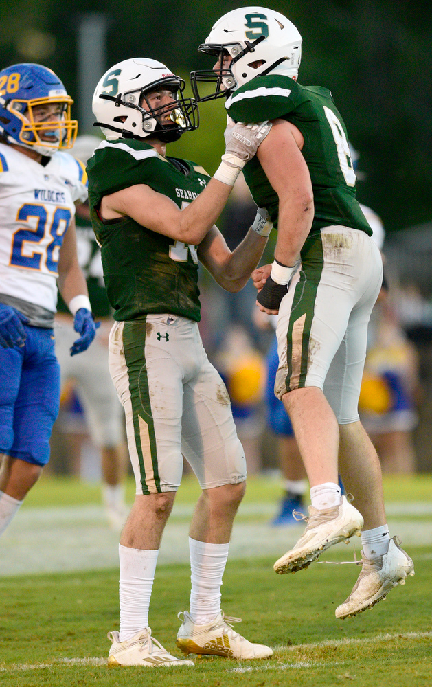 Staff Photo by Robin Rudd / Silverdale's Cameron Mullins (10) and Brody Lamb (8) celebrate a big stop by Lamb. The Silverdale Academy Seahawks hosted the Donelson Christian Academy Bobcats in TSSAA football on September 24, 2021.