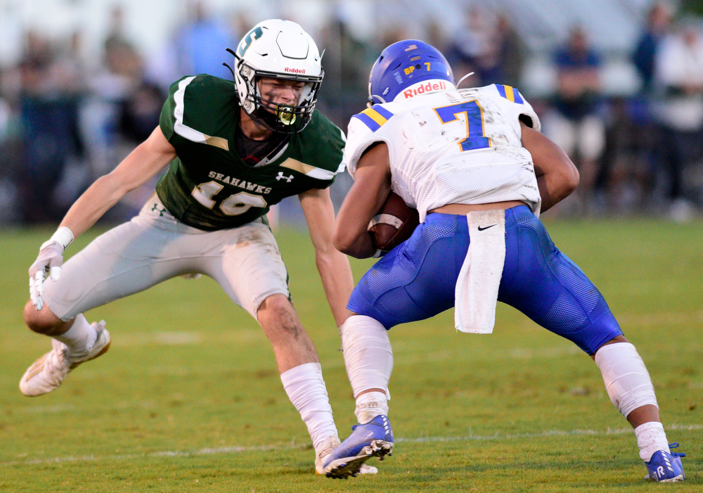 Staff Photo by Robin Rudd / Silverdale's Cameron Mullins (10) prepares to tackle Donelson's Nathan Magalei (7). The Silverdale Academy Seahawks hosted the Donelson Christian Academy Bobcats in TSSAA football on September 24, 2021.