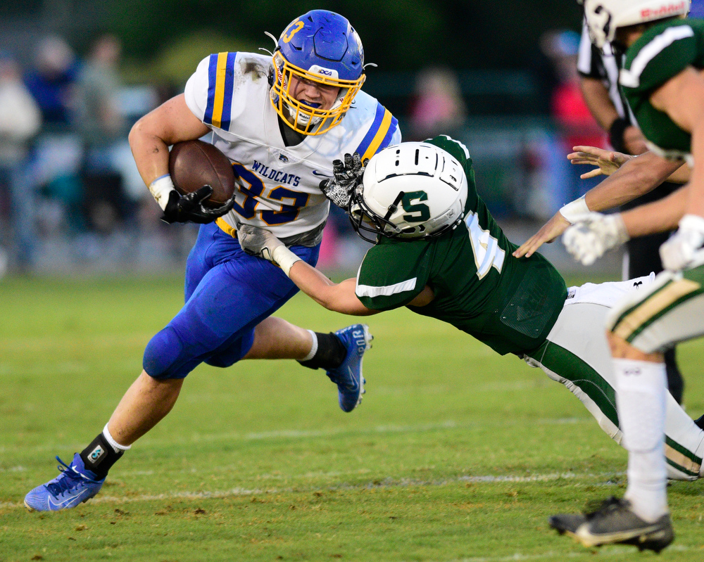 Staff Photo by Robin Rudd / Silverdale's Jackson Hattaway (4) stops Donelson's Brady Russell (33) on fourth down. The Silverdale Academy Seahawks hosted the Donelson Christian Academy Bobcats in TSSAA football on September 24, 2021.