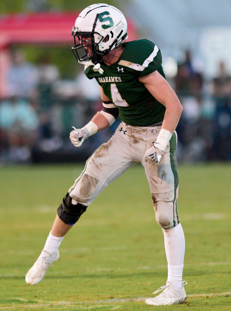 Staff Photo by Robin Rudd / Silverdale's Jackson Hattaway (4) celebrates a big fourth down stop. The Silverdale Academy Seahawks hosted the Donelson Christian Academy Bobcats in TSSAA football on September 24, 2021.