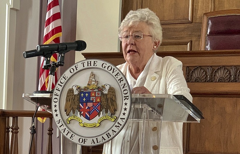 FILE - In this July 29, 2020 file photo, Alabama Gov. Kay Ivey speaks during a news conference in Montgomery, Ala. Alabama lawmakers return to Montgomery on Monday, Sept. 27, 2021, to vote on a $1.3 billion prison construction plan proponents say will help address the state's longstanding problems in corrections, but critics argue the troubles go much deeper and won't be remedied with brick, mortar and bars. Alabama Gov. Kay Ivey called a special session next week for lawmakers to vote on the construction plan as well as a sentencing and supervision bill. Ivey said Alabama is risking a federal takeover of the prison system. (AP Photo/Kim Chandler, File)