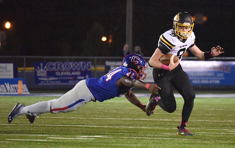 Staff File Photo by Matt Hamilton / McMinn County quarterback Jayden Miller (9) scored four touchdowns and added two, 2-point conversions in last Friday's comeback non-region home win over East Hamilton.