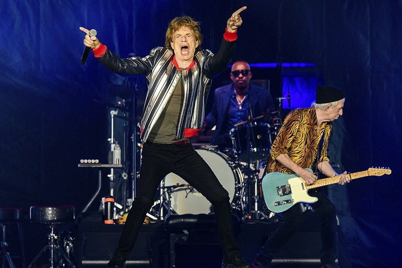 Mick Jagger, from left, Steve Jordan and Keith Richards of the Rolling Stones perform during the "No Filter" tour at The Dome at America's Center, Sunday, Sept. 26, 2021, in St. Louis. (Photo by Amy Harris/Invision/AP)