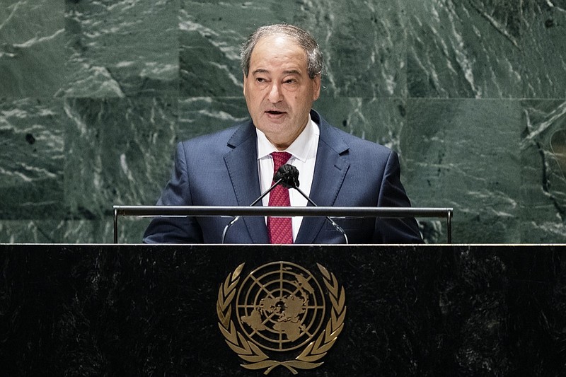 Syria's foreign minister Faisal Mekdad addresses the 76th Session of the United Nations General Assembly, Monday, Sept. 27, 2021, at U.N. headquarters. (AP Photo/John Minchillo, Pool)

