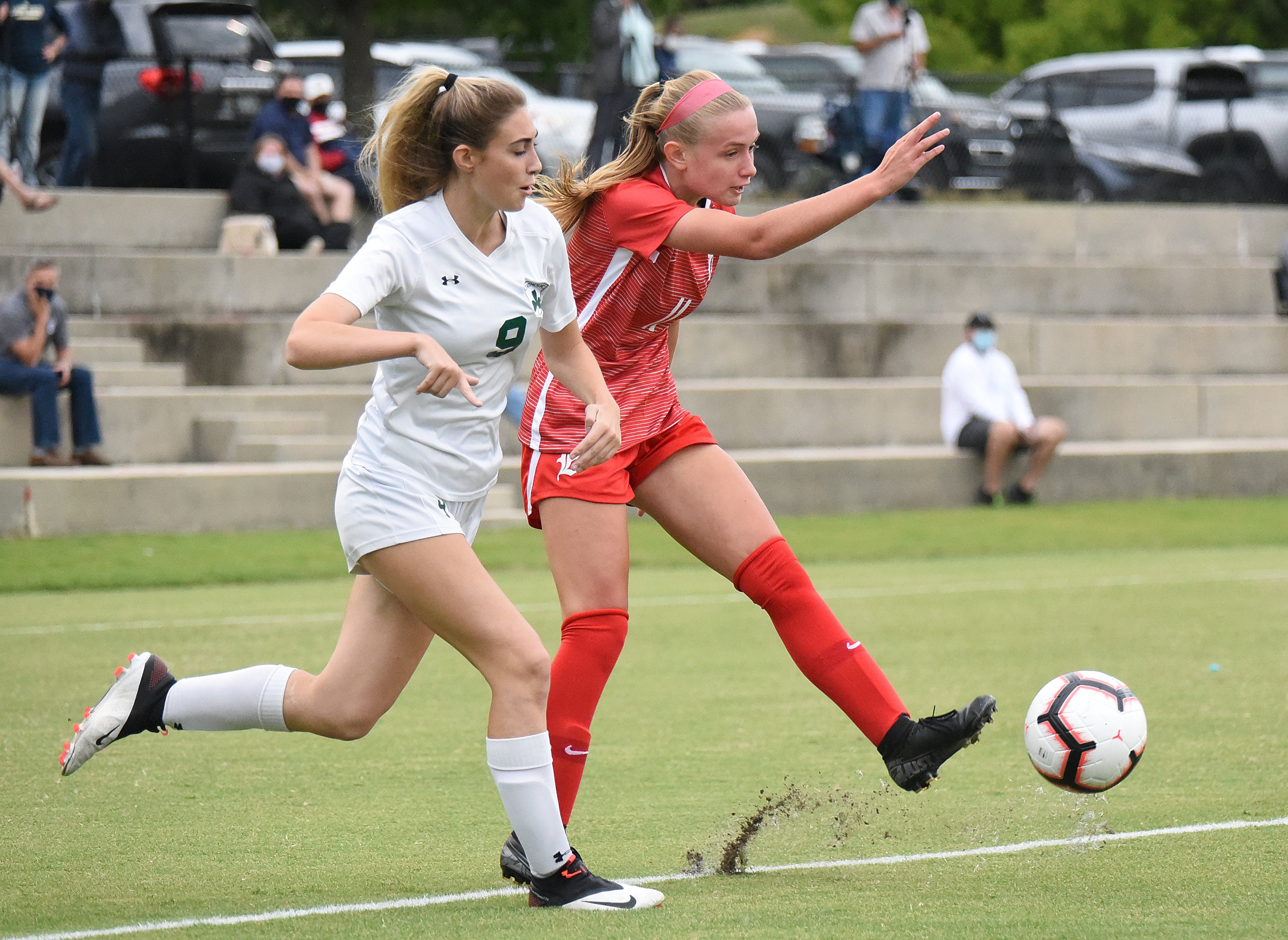 Staff Photo by Matt Hamilton / Baylor (11) Zoey Mize fires the ball toward the net as Knoxville Catholic (9) Bella Flask defends. Baylor went on to lose to Knoxville Catholic High School 1-0 on Tuesday, Sept. 22, 2020.