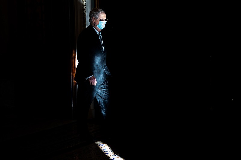 Photo by Erin Schaff of The New York Times / Senate Majority Leader Mitch McConnell, R-Kentucky, leaves the Senate floor after a vote on Capitol Hill in Washington on Nov. 18, 2020. "Nobody has ever accused McConnell of being stupid. He knows quite well just how disastrous failing to raise the debt limit could be," writes New York Times columnist Paul Krugman.