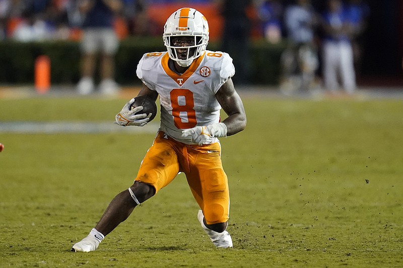 Tennessee running back Tiyon Evans (8) runs against Florida during the second half of an NCAA college football game, Saturday, Sept. 25, 2021, in Gainesville, Fla. (AP Photo/John Raoux)