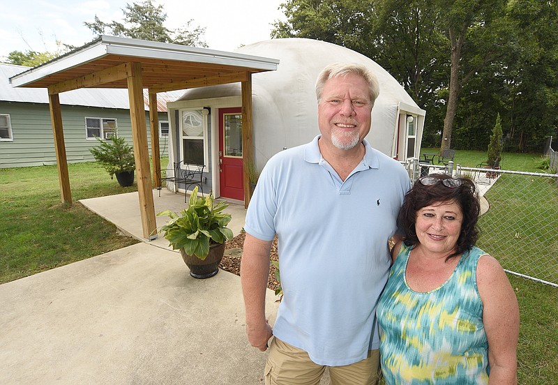 Staff Photo by Matt Hamilton / Glenn Bodnar, left, and Donna Brownfield at their round rental home, the first monolithic dome home in the city of Chattanooga.