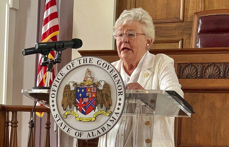 In this July 29, 2020 file photo, Alabama Gov. Kay Ivey speaks during a news conference in Montgomery, Ala. Alabama lawmakers return to Montgomery on Monday, Sept. 27, 2021, to vote on a $1.3 billion prison construction plan proponents say will help address the state's longstanding problems in corrections, but critics argue the troubles go much deeper and won't be remedied with brick, mortar and bars. Alabama Gov. Kay Ivey called a special session next week for lawmakers to vote on the construction plan as well as a sentencing and supervision bill. Ivey said Alabama is risking a federal takeover of the prison system. (AP Photo/Kim Chandler, File)