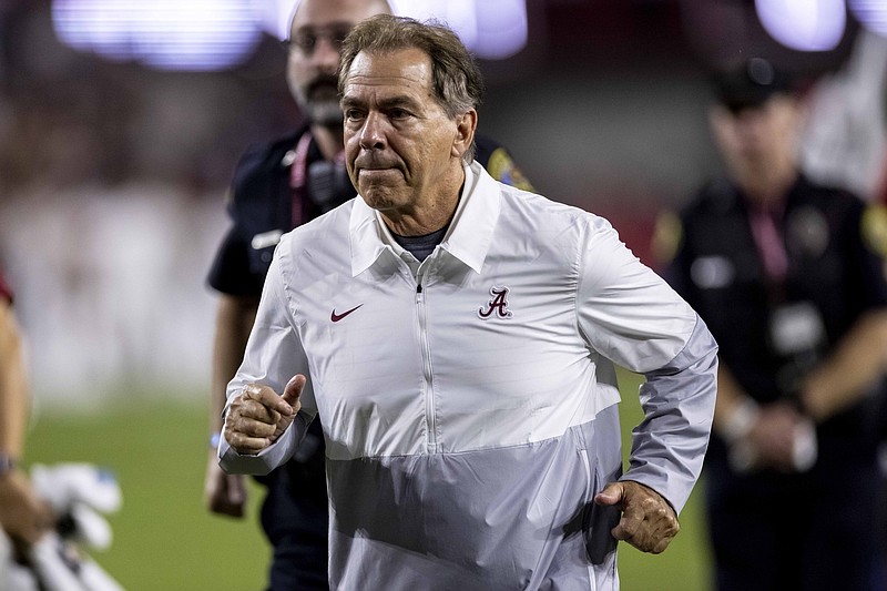 AP photo by Vasha Hunt / Alabama football coach Nick Saban jogs off the field after the top-ranked Crimson Tide routed Southern Miss on Saturday in Tuscaloosa.