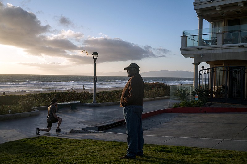 New York Times photo by Gabriella Angotti-Jones / Duane Yellow Feather Shepard in Manhattan Beach, California, in March at the site where members of his family ran a thriving beachfront resort that was seized by eminent domain nearly a century ago.