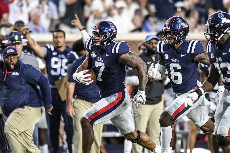 AP photo by Bruce Newman / Ole Miss defensive lineman Sam Williams returns a fumble recovery for a touchdown against visiting Austin Peay on Sept. 11. After an open date last week, the Rebels are set to visit Alabama with both defenses hoping to avoid the high-scoring affair that occurred when the Crimson Tide won 63-48 in October 2020.