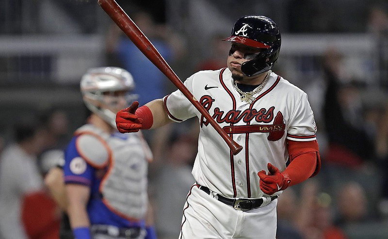 AP photo by Ben Margot / The Atlanta Braves' William Contreras tosses his bat after hitting a home run off the New York Mets' Carlos Carrasco in the fourth inning of Saturday night's game in Atlanta.