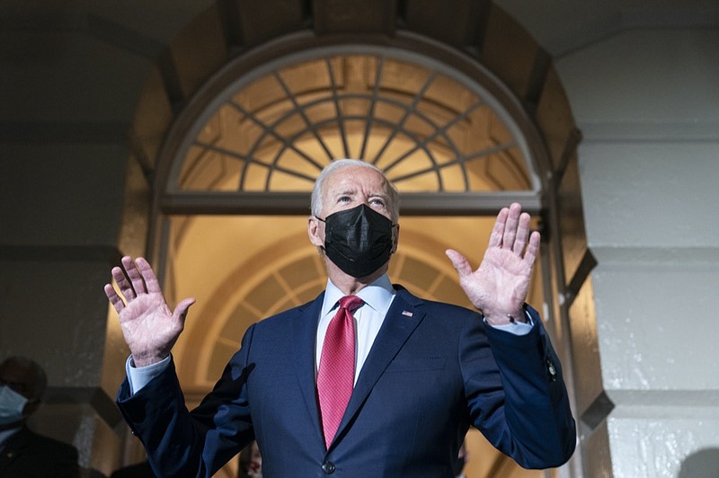 FILE - In this Oct. 1, 2021, file photo President Joe Biden speaks with reporters as he departs after a House Democratic Caucus meeting on Capitol Hill in Washington. (AP Photo/Alex Brandon, File)


