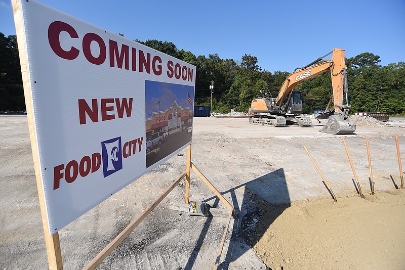 Staff Photo by Matt Hamilton / A sign stands at the site of a new Food City in East Ridge on Wednesday, September 29, 2021. The new store, at 3636 Ringgold Road, will be about 30% larger, feature a cafe, a Starbucks, sushi, a pizza oven, expanded produce and more.