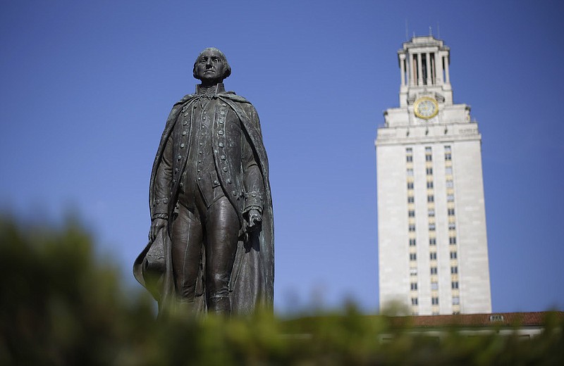 Photo by Eric Gay of The Associated Press / In this Nov. 29, 2012, file photo, a statue of George Washington stands near the University of Texas Tower at the center of campus, in Austin, Texas.