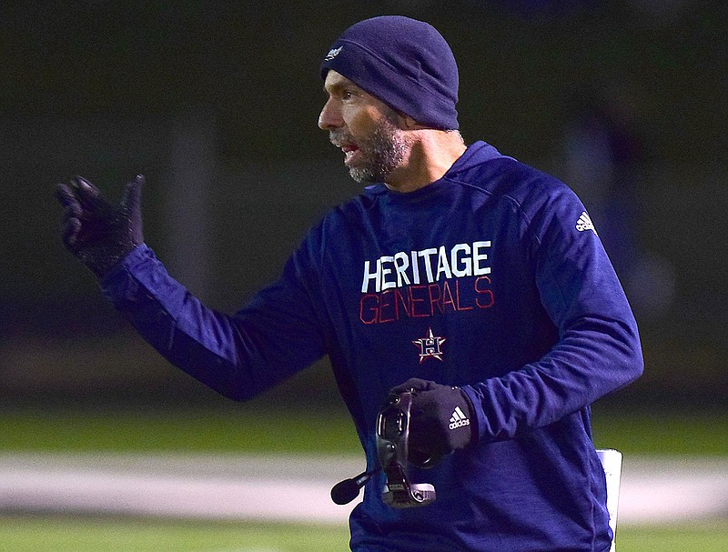 Staff file photo by Robin Rudd / Heritage football coach E.K. Slaughter