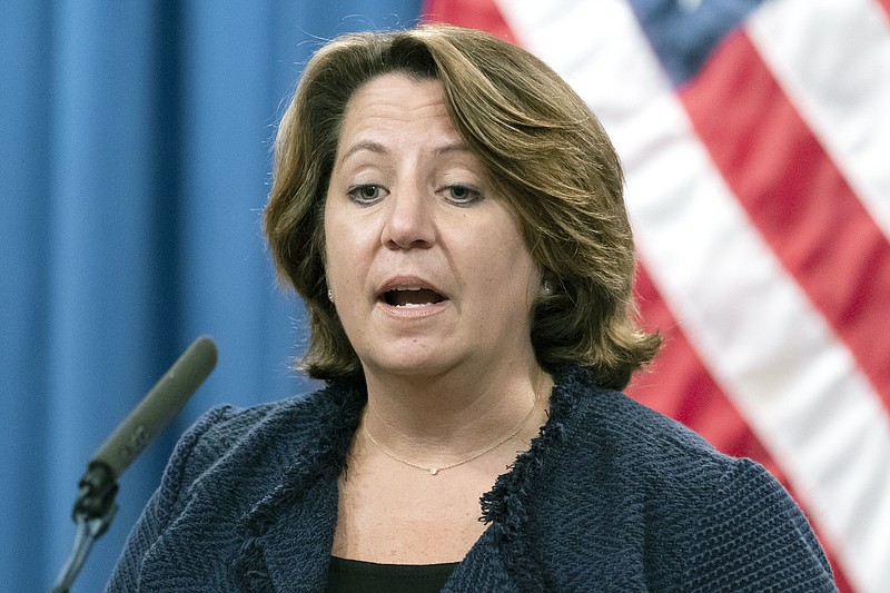 FILE - In this Sept. 30, 2021 photo, Deputy Attorney General Lisa Monaco speaks with reporters during a news conference at the Department of Justice in Washington. Monaco said the Justice Department, as part of a new initiative, is prepared to take legal action under a statute called the False Claims Act against contractors who misuse federal dollars by failing to disclose hacks or by having deficient cybersecurity standards. The department will also protect whistleblowers who come forward to report those issues. (AP Photo/Alex Brandon)