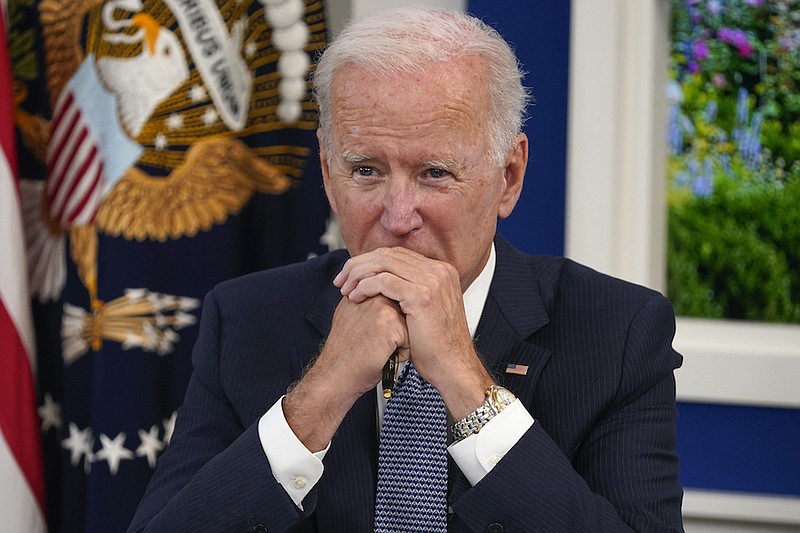 President Joe Biden listens during a meeting with business leaders about the debt limit in the South Court Auditorium on the White House campus, Wednesday, Oct. 6, 2021, in Washington. (AP Photo/Evan Vucci)