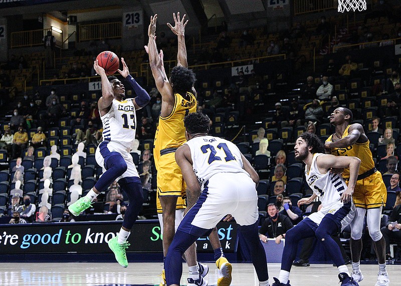 Staff photo by Troy Stolt / UTC guard Malachi Smith shoots during a SoCon game against East Tennessee State on Feb. 15 at McKenzie Arena. Smith, an all-conference first-team selection, is among the core group returning for the Mocs as they prepare for their fifth season under coach Lamont Paris.