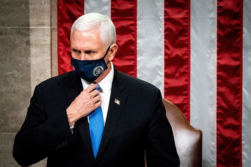 File photo by Erin Schaff of The New York Times / Vice President Mike Pence presides as a joint session of Congress convenes to certify the Electoral College vote on Jan. 6, 2021.