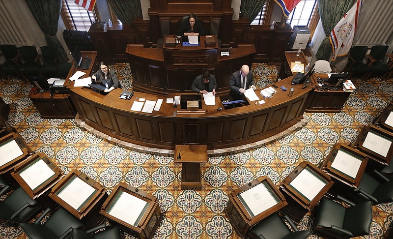 AP file photo by Mark Humphrey / Legislative workers practice parliamentary procedure in the Senate chamber in Nashville in 2019.