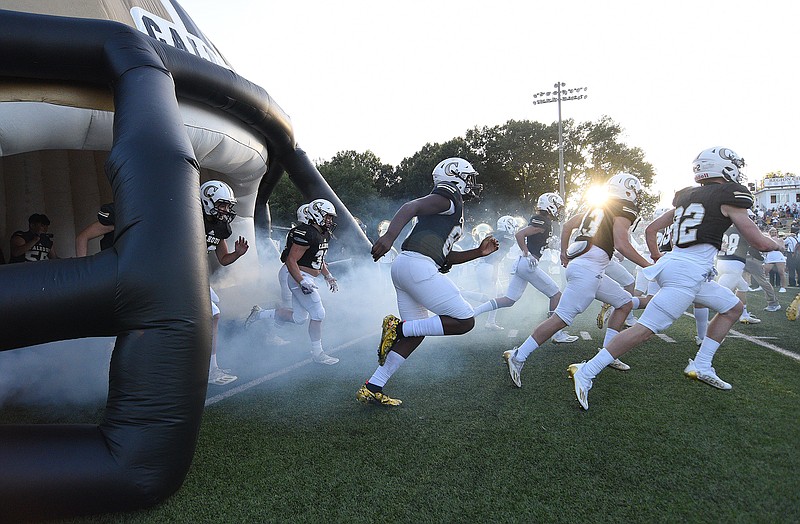 Staff photo by Matt Hamilton / The Calhoun High School football team takes the field for a home game against McCallie on Aug. 27. Calhoun won 32-27 at Blessed Trinity on Friday night in a GHSA Region 7-AAAAA game between teams with top-10 state rankings.