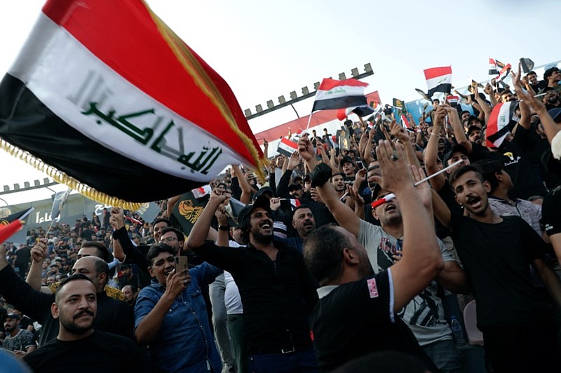 Followers of a political movement called "Al-Fateh Alliance" chant during a rally before the parliamentary elections in Baghdad, Iraq, Tuesday, Oct. 5, 2021. (AP Photo/Khalid Mohammed)

