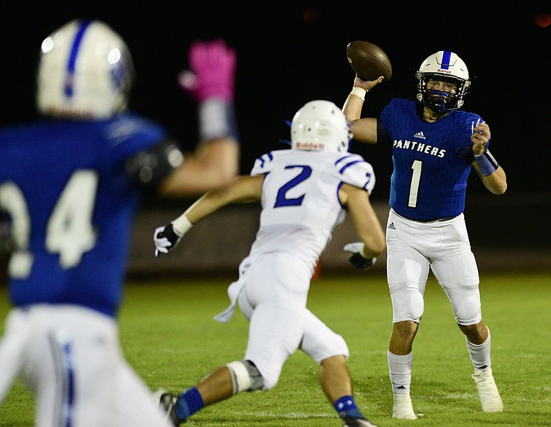 Staff Photo by Robin Rudd / Sale Creek's Camden Penny (1) throws a pass to Nick Hall (24). The Sale Creek Panthers hosted the Jackson County Blue Devils in the first game played at Tobin Davidson Stadium and Sports Complex on September 3, 2021.