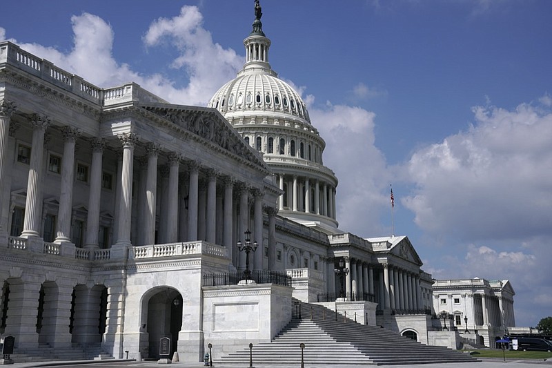 FILE - This Sept. 18, 2021, file photo shows the East Front of the U.S, Capitol in Washington. Members of the House are scrambling to Washington to pass a short-term lift of the nation's debt limit. The vote Tuesday will ensure the federal government can continue fully paying its bills into December. House Democrats are expected to have enough votes on their own to ensure that President Joe Biden can sign the bill into law this week. (AP Photo/J. Scott Applewhite, File)