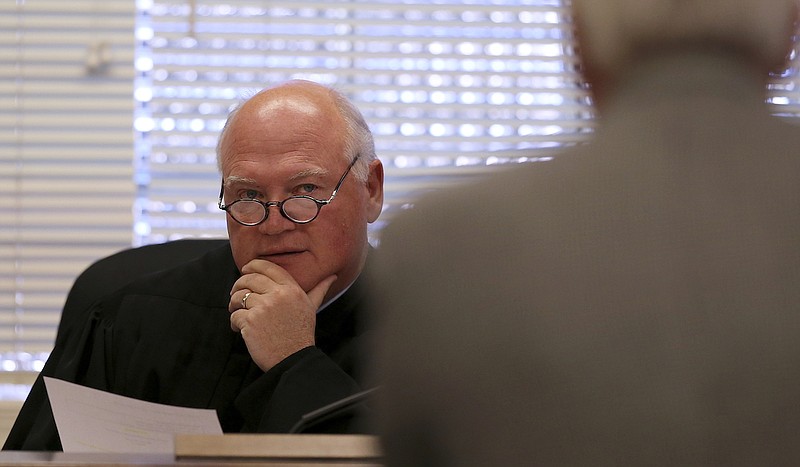 In this 2017 staff file photo, Judge Don Ash listens to an attorney in the courtroom at the Cleveland Municipal Building in Cleveland, Tenn. / Staff file photo