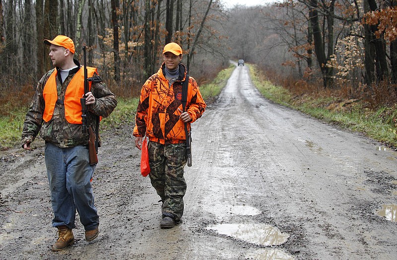 AP file photo by Keith Srakocic / In addition to such essentials as safety orange attire and proper weapons and ammo, deer hunters should hit the trail with the right snacks to pass their time in the stand, writes "Guns & Cornbread" columnist Larry Case.