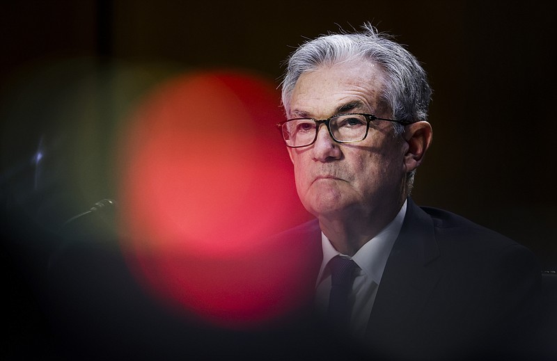 Federal Reserve Chairman Jerome Powell testifies during a Senate Banking, Housing and Urban Affairs Committee hearing on the CARES Act on Capitol Hill, Tuesday, Sept. 28, 2021 in Washington.  Powell is defending the ultra-low interest rate policies he has pursued since the pandemic decimated the economy more than 18 months ago. He acknowledges, however, that inflation has stayed higher for longer than he expected.  (Kevin Dietsch/Pool via AP)